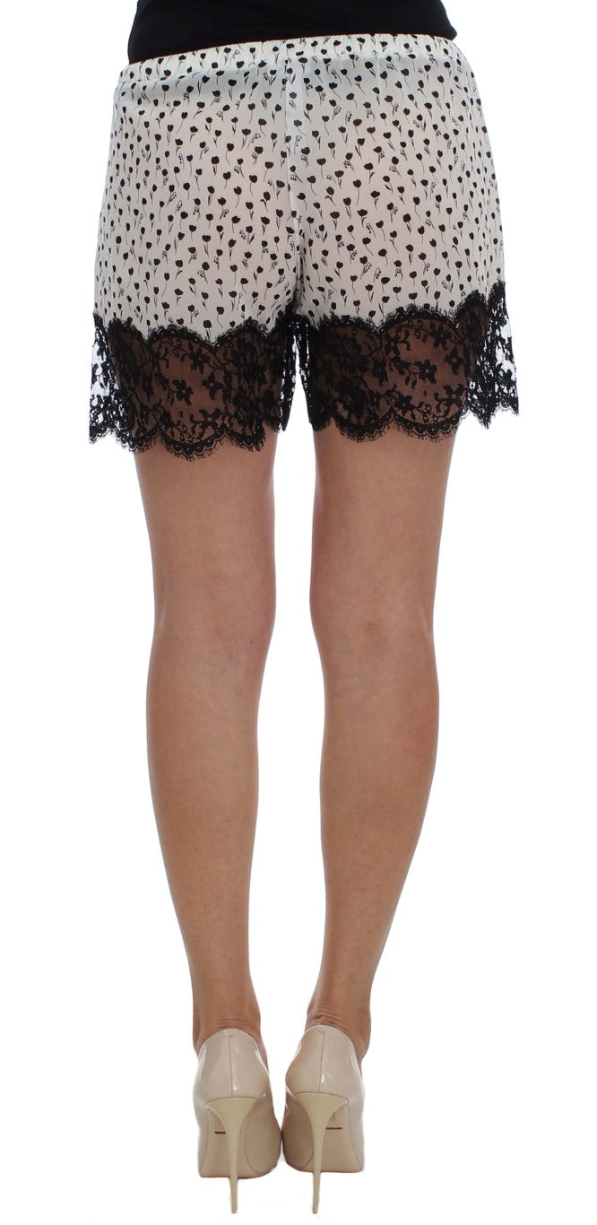 Dolce &amp; Gabbana Weiß-schwarze Nachtwäsche-Shorts aus Seide mit floraler Spitze