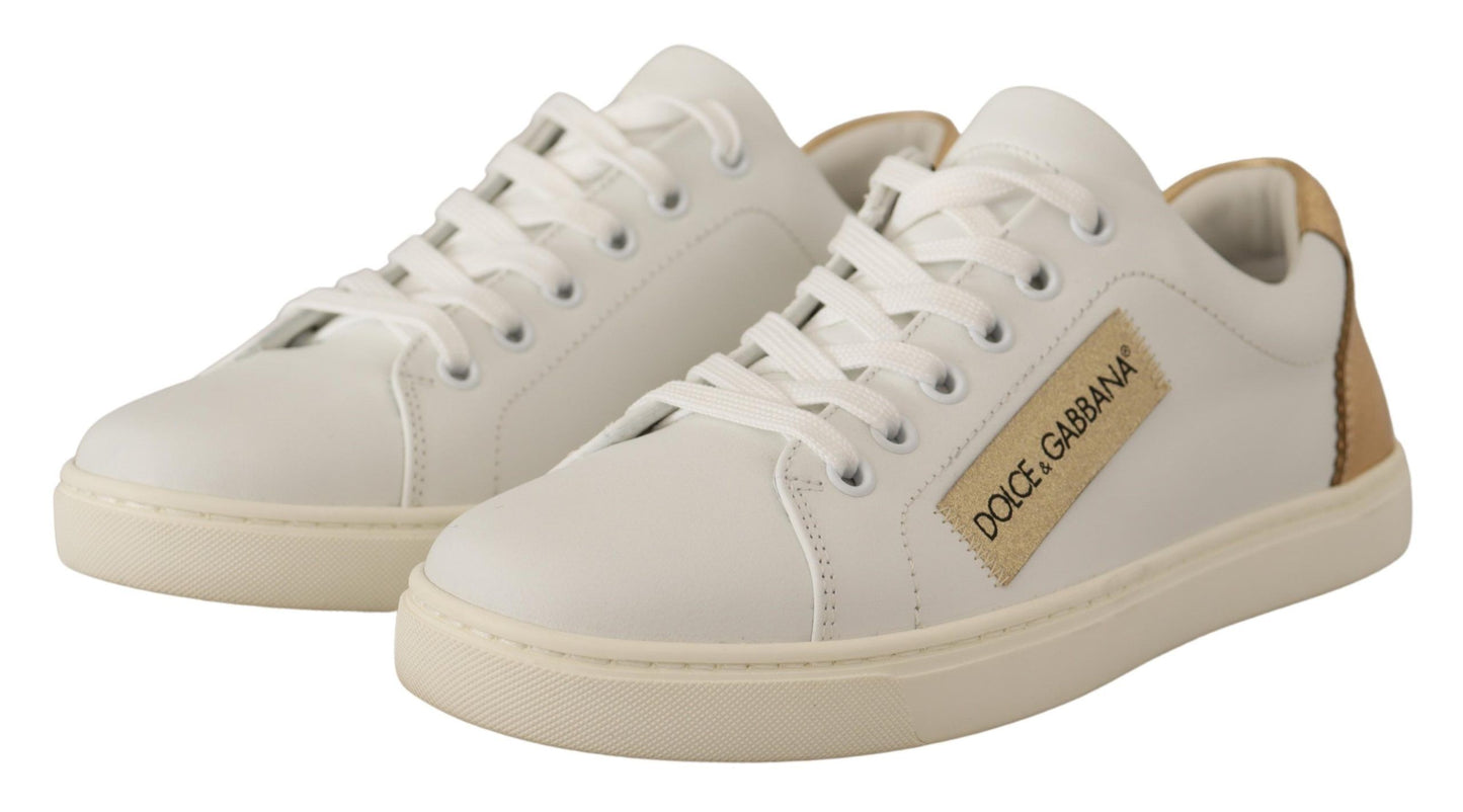 Dolce &amp; Gabbana Baskets basses en cuir doré blanc