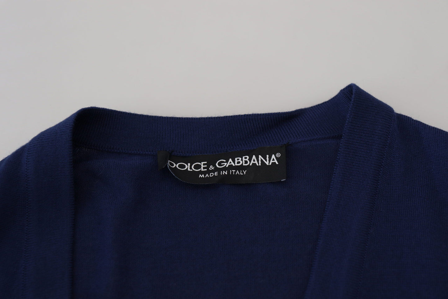 Dolce &amp; Gabbana Blauer Wollpullover mit V-Ausschnitt und Knopfleiste