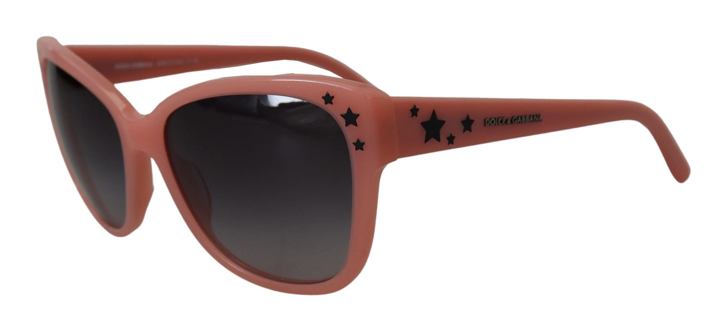 Dolce &amp; Gabbana Lunettes de soleil à monture en acétate rose avec embellissement d'étoiles DG4124