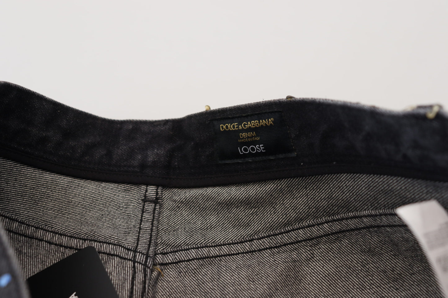 Dolce &amp; Gabbana Schwarze zerfetzte Denim-Jeans mit mehrfarbigem Aufdruck