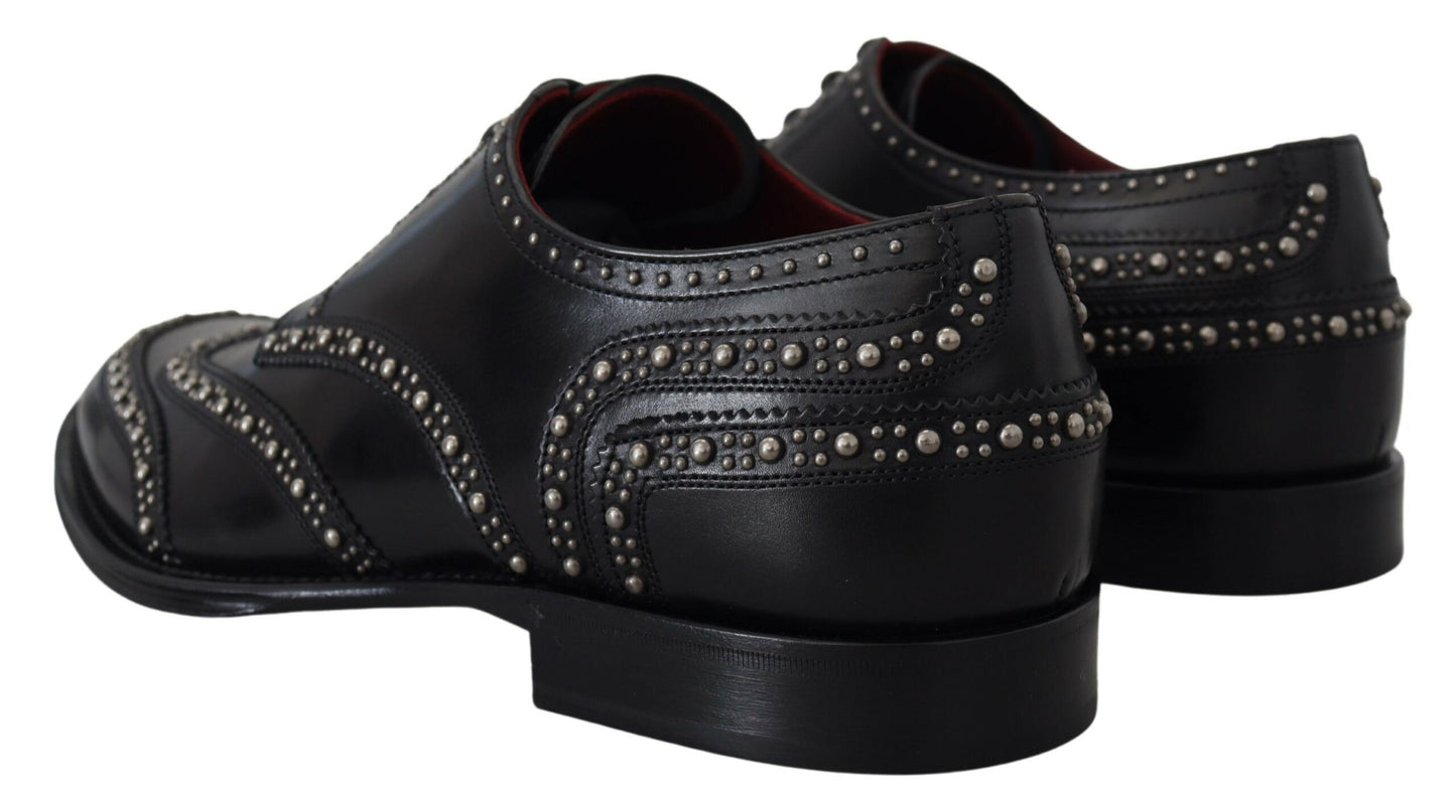 Dolce &amp; Gabbana Chaussures cloutées en cuir noir avec robe derby