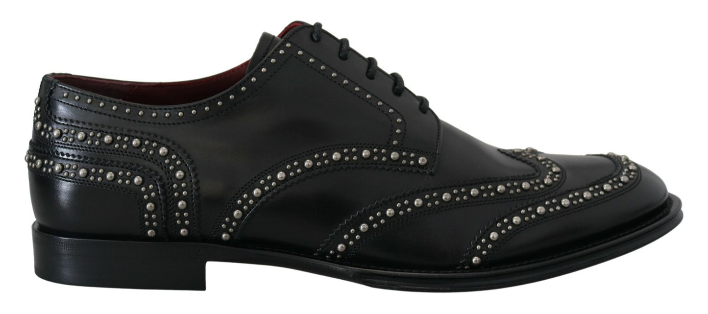 Dolce &amp; Gabbana Chaussures cloutées en cuir noir avec robe derby