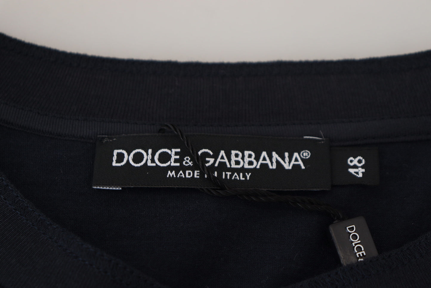 Dolce &amp; Gabbana Pull à col rond boutonné en coton bleu