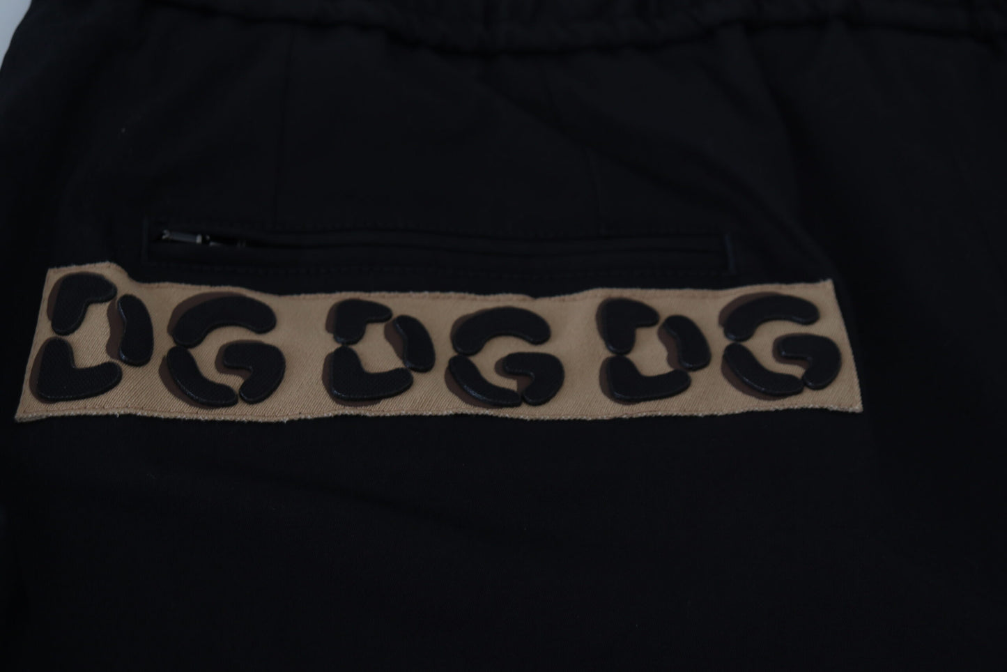 Dolce &amp; Gabbana Pantalon court en coton noir à taille élastique avec logo DG