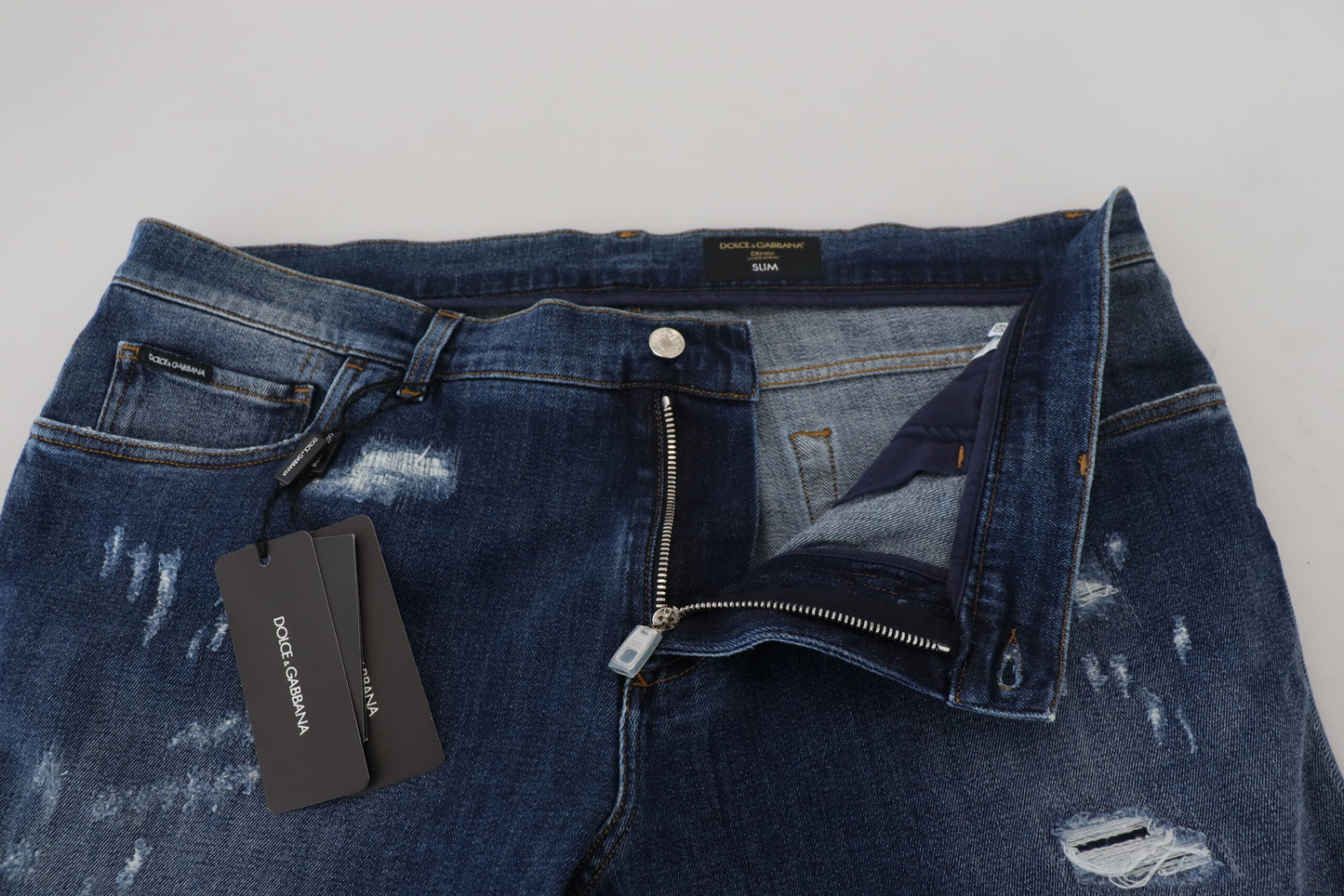 Dolce &amp; Gabbana Jean slim en denim stretch en coton bleu en lambeaux