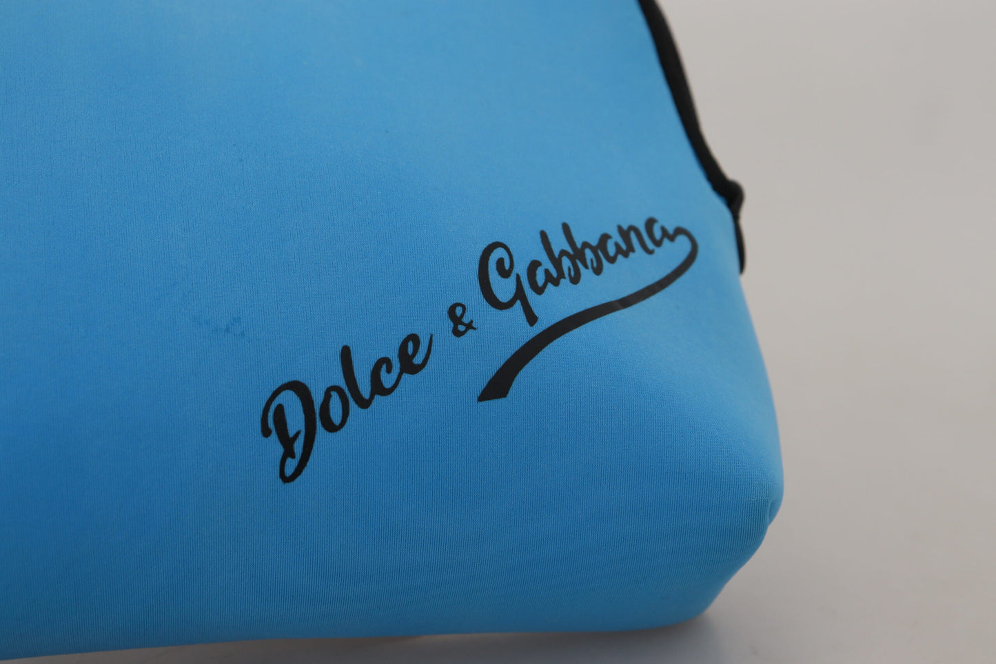 Dolce &amp; Gabbana Pochette à main bleue à imprimé logo Trousse de toilette à imprimé léopard