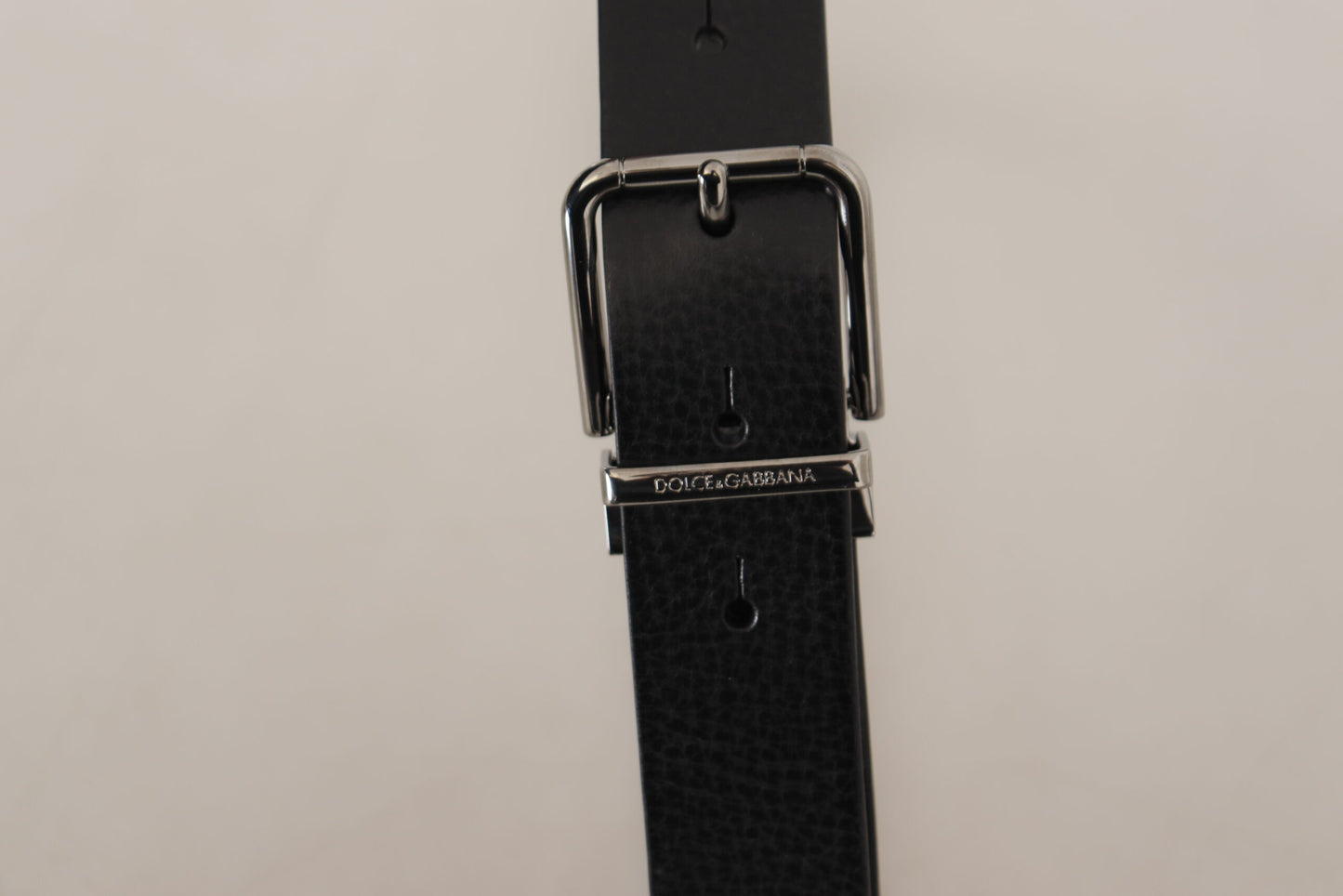 Dolce &amp; Gabbana Ceinture à boucle en métal argenté en cuir uni noir