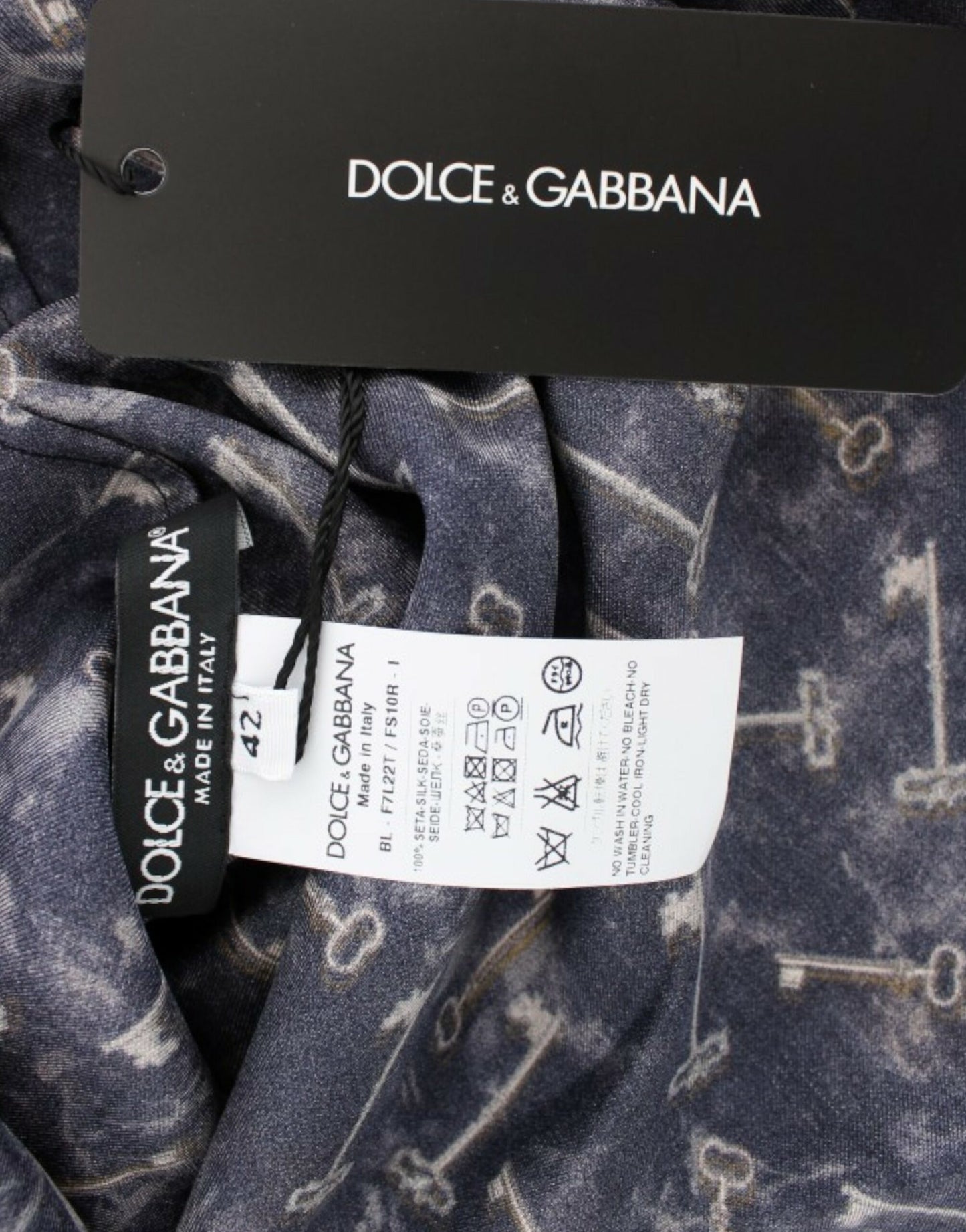 Dolce &amp; Gabbana Blaugoldene Seidenbluse mit Schlüsselmuster